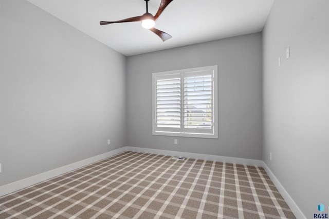 7324 E Twin Pines Ct, Sioux Falls, SD 57110 - spare room with ceiling fan, baseboards, and carpet