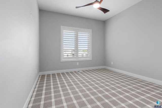 7324 E Twin Pines Ct, Sioux Falls, SD 57110 - carpeted empty room featuring baseboards and ceiling fan