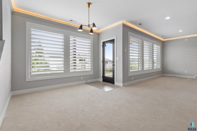 7324 E Twin Pines Ct, Sioux Falls, SD 57110 - carpeted empty room with baseboards, a chandelier, and ornamental molding
