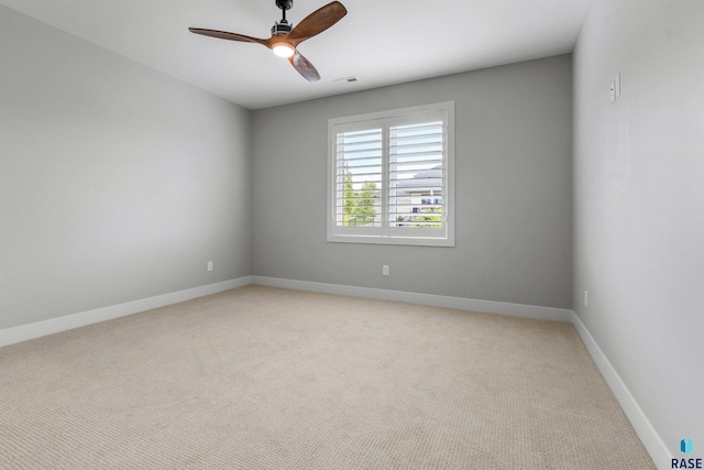 7324 E Twin Pines Ct, Sioux Falls, SD 57110 - empty room with a ceiling fan, light colored carpet, and baseboards