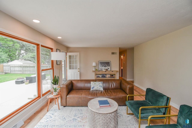 2804 S 1st Ave, Sioux Falls, SD 57105 - living area with wood finished floors, baseboards, and recessed lighting