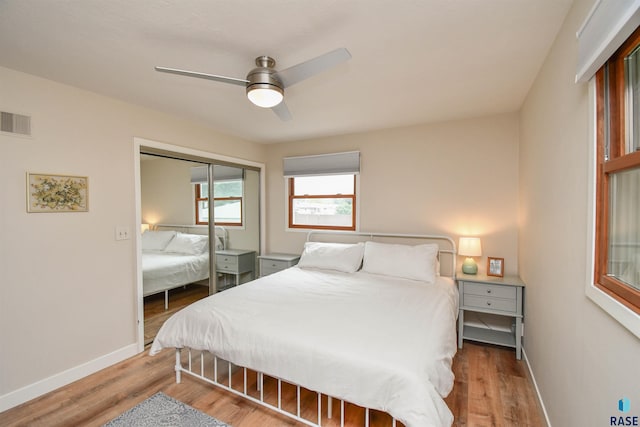 2804 S 1st Ave, Sioux Falls, SD 57105 - bedroom featuring wood finished floors, baseboards, a closet, and a ceiling fan