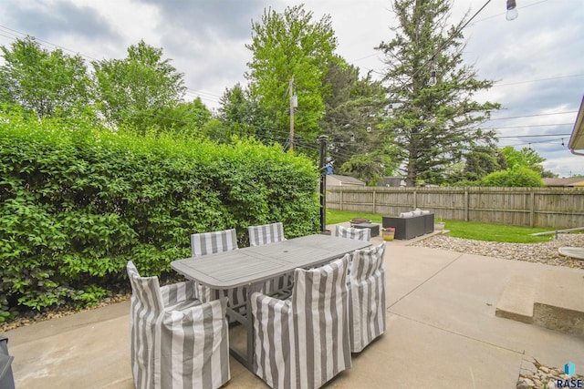 2804 S 1st Ave, Sioux Falls, SD 57105 - fenced backyard featuring a patio and outdoor dining space