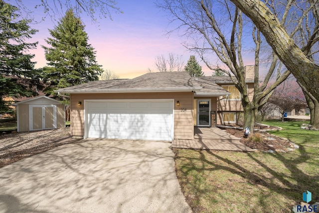 1304 N Tahoe Trl, Sioux Falls, SD 57110 - view of front facade featuring concrete driveway, a yard, and a garage