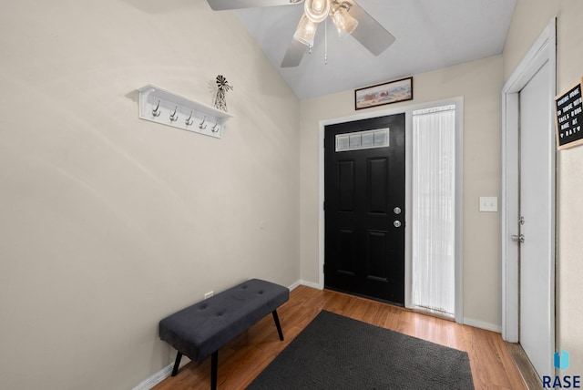 1304 N Tahoe Trl, Sioux Falls, SD 57110 - entrance foyer with wood finished floors, a ceiling fan, and baseboards