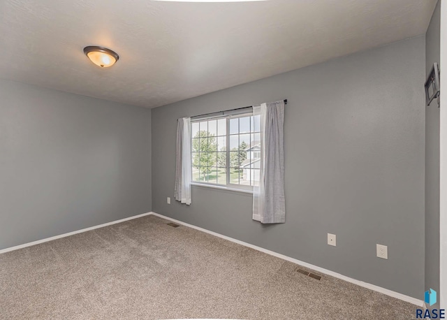 6501 S Santa Rosa Pl, Sioux Falls, SD 57108 - spare room with carpet and baseboards