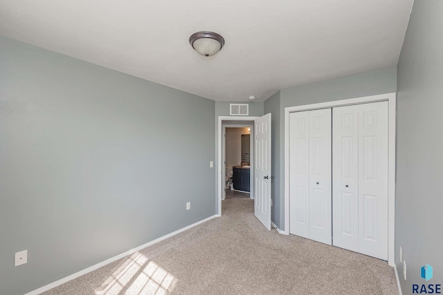6501 S Santa Rosa Pl, Sioux Falls, SD 57108 - unfurnished bedroom with carpet, baseboards, and a closet