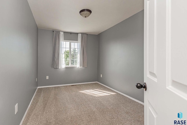 6501 S Santa Rosa Pl, Sioux Falls, SD 57108 - spare room with carpet flooring and baseboards