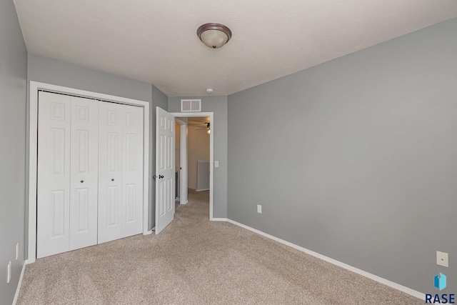 6501 S Santa Rosa Pl, Sioux Falls, SD 57108 - unfurnished bedroom with carpet, a closet, and baseboards