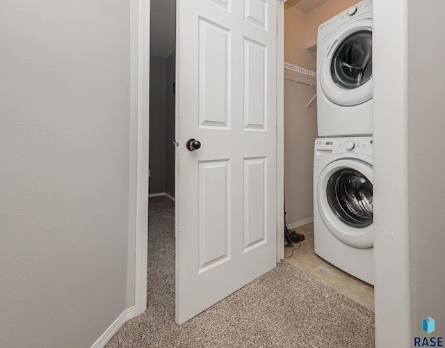 6501 S Santa Rosa Pl, Sioux Falls, SD 57108 - laundry room featuring estacked washer and dryer and baseboards