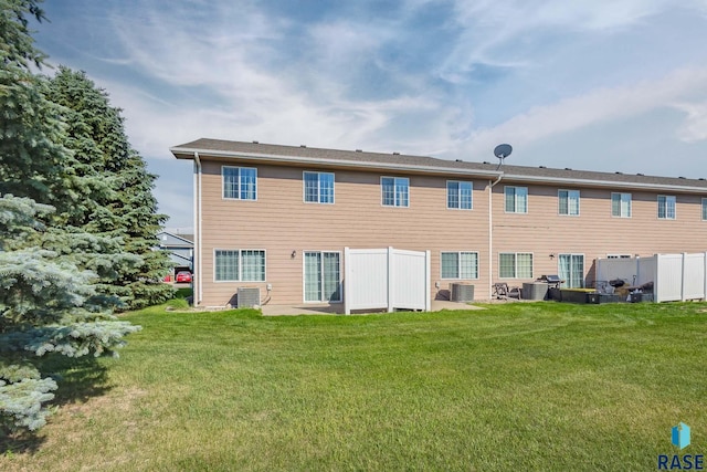 6501 S Santa Rosa Pl, Sioux Falls, SD 57108 - rear view of property with central AC and a patio area