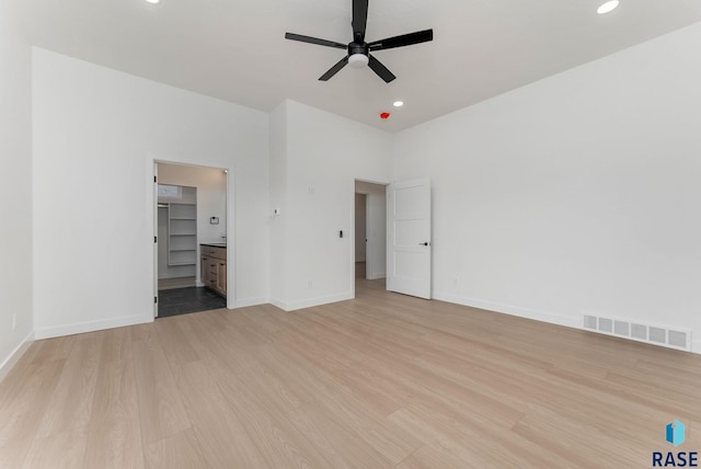 413 W 5th St, Crooks, SD 57020 - unfurnished bedroom with light wood-type flooring, recessed lighting, baseboards, and a ceiling fan