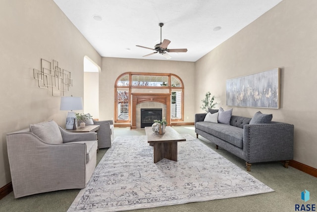 417 E Meadowlark Cir, Brandon, SD 57005 - carpeted living area with ceiling fan, baseboards, and a tile fireplace