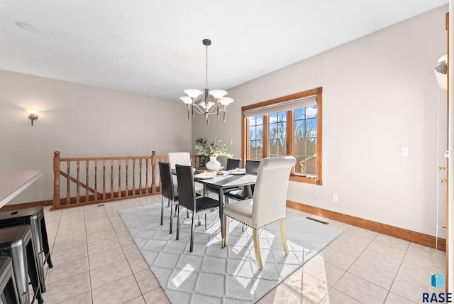 417 E Meadowlark Cir, Brandon, SD 57005 - dining area with a chandelier, light tile patterned floors, and baseboards