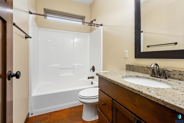 301 S Spring Pl, Brandon, SD 57005 - full bathroom featuring vanity, wood finished floors, toilet, and tub / shower combination