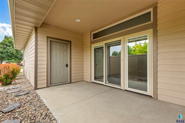 301 S Spring Pl, Brandon, SD 57005 - entrance to property with a patio area