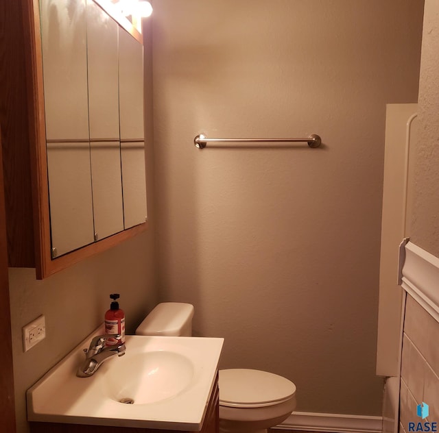 3605 E 18th St, Sioux Falls, SD 57103 - half bathroom with toilet and vanity