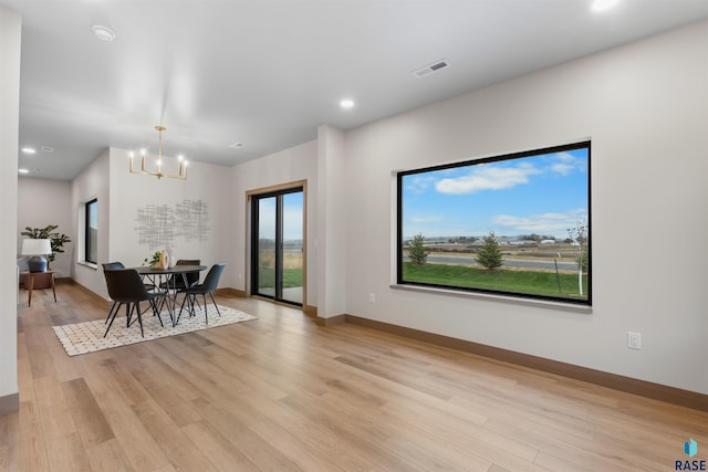 7309 E Shadow Pine Cir, Sioux Falls, SD 57110 - dining space with a chandelier, light wood-style flooring, recessed lighting, and baseboards