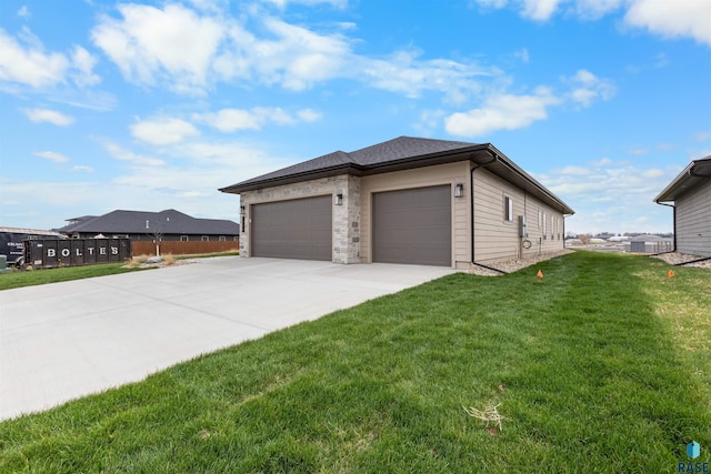 7309 E Shadow Pine Cir, Sioux Falls, SD 57110 - view of side of home featuring driveway, a lawn, and a garage
