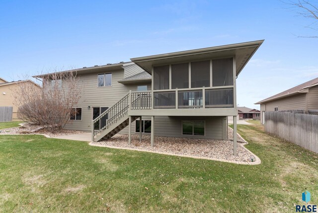 7005 E Archstone St, Sioux Falls, SD 57110 - back of house with a sunroom and stairway