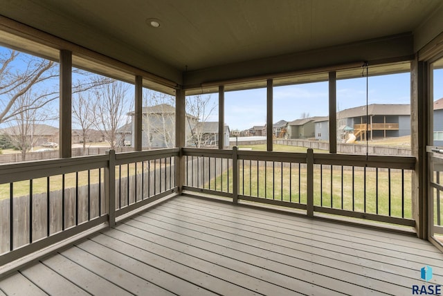 7005 E Archstone St, Sioux Falls, SD 57110 - unfurnished sunroom with a residential view