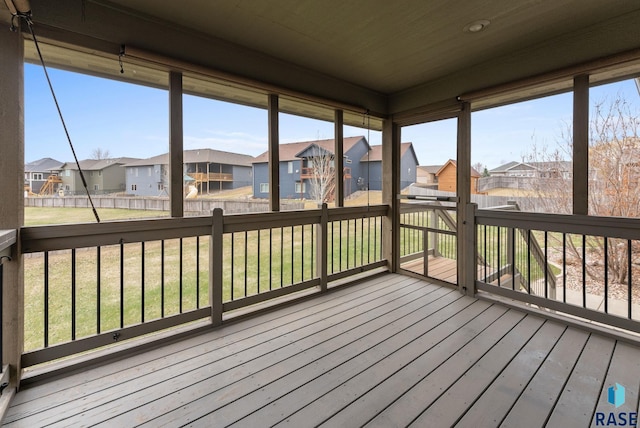7005 E Archstone St, Sioux Falls, SD 57110 - unfurnished sunroom featuring a residential view