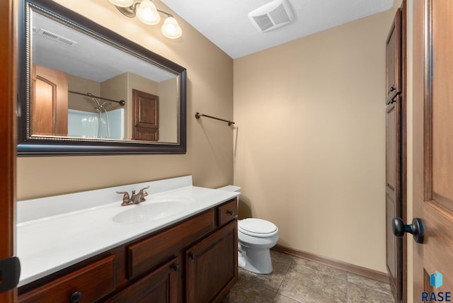 7005 E Archstone St, Sioux Falls, SD 57110 - bathroom featuring vanity, toilet, baseboards, and a shower