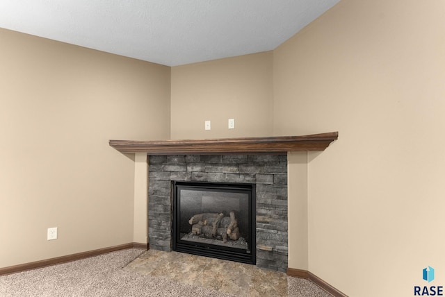 7005 E Archstone St, Sioux Falls, SD 57110 - detailed view of carpet floors, a glass covered fireplace, and baseboards