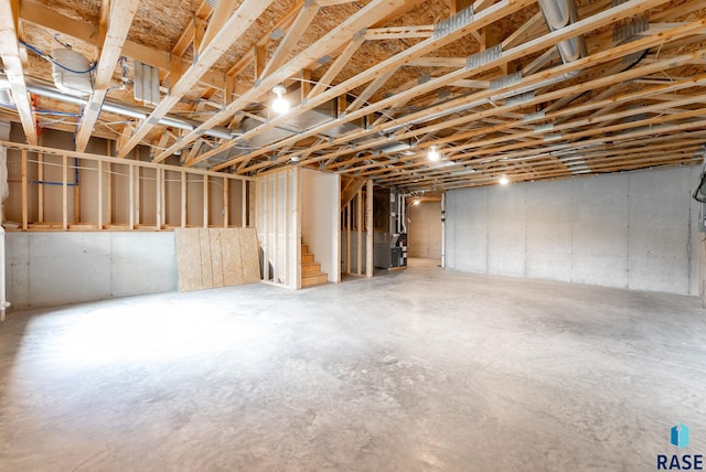 7005 E Archstone St, Sioux Falls, SD 57110 - unfinished basement with heating unit and stairway
