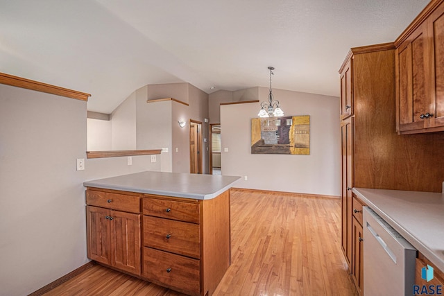 5547 S Wexford Ct, Sioux Falls, SD 57106 - kitchen with dishwasher, brown cabinetry, a peninsula, light wood finished floors, and lofted ceiling