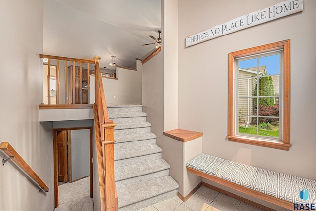5547 S Wexford Ct, Sioux Falls, SD 57106 - staircase featuring vaulted ceiling, tile patterned floors, and ceiling fan