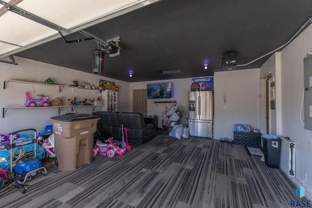 2554 E Meadowside Pl, Sioux Falls, SD 57108 - garage featuring stainless steel fridge and a garage door opener