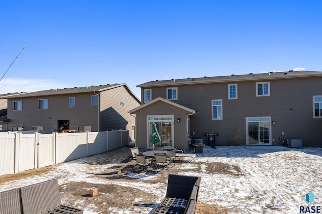 2554 E Meadowside Pl, Sioux Falls, SD 57108 - snow covered property with central AC