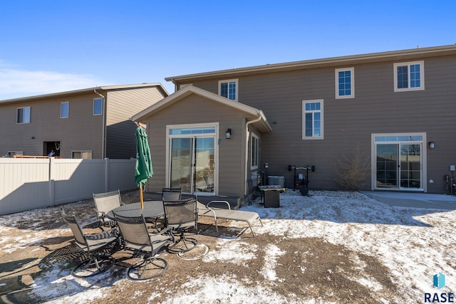 2554 E Meadowside Pl, Sioux Falls, SD 57108 - snow covered house with a patio area