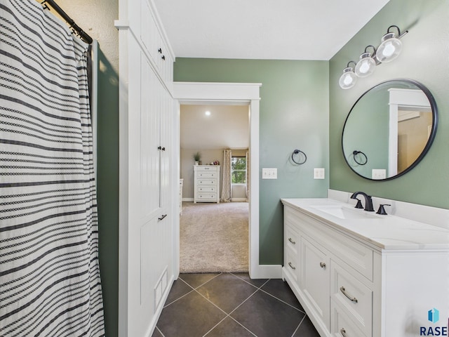 577 60th Ave, Beaver Creek, MN 56116 - bathroom with vanity, tile patterned floors, and baseboards