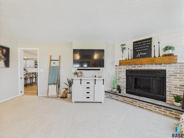 577 60th Ave, Beaver Creek, MN 56116 - unfurnished living room featuring carpet flooring, a fireplace, and baseboards