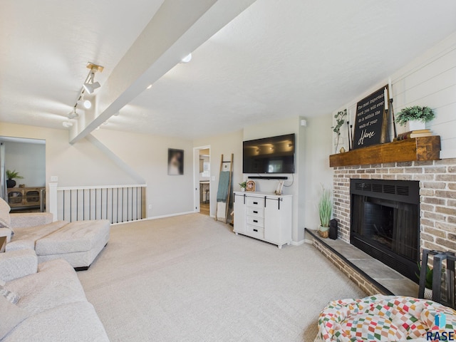 577 60th Ave, Beaver Creek, MN 56116 - living area featuring light colored carpet, a fireplace, and baseboards