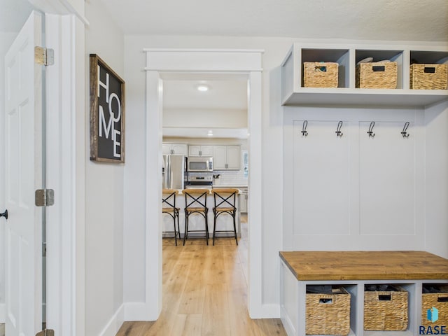 577 60th Ave, Beaver Creek, MN 56116 - mudroom with light wood-style floors and baseboards