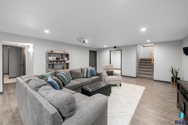 1325 W Whitechurch Ln, Sioux Falls, SD 57108 - living room featuring recessed lighting, stairway, light wood-style flooring, and baseboards