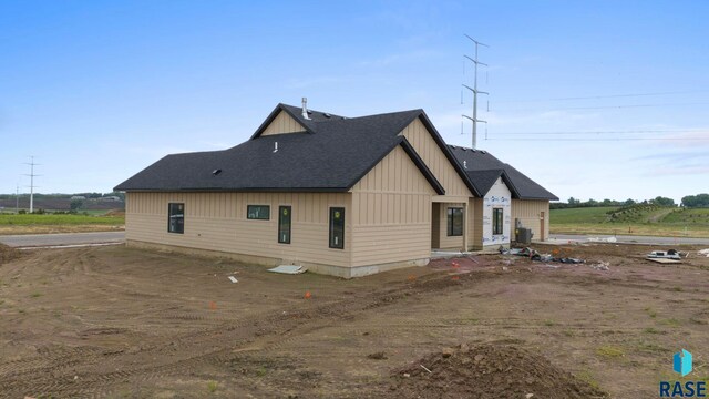 1112 N Slate Ave, Brandon, SD 57005 - view of property exterior with board and batten siding and roof with shingles