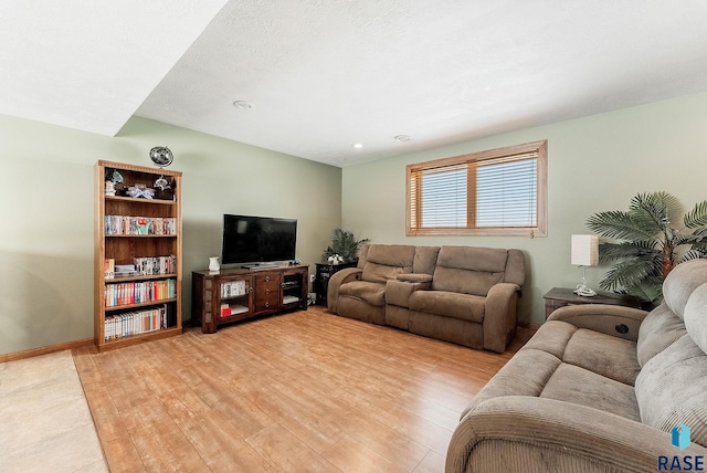 27549 475th Ave, Worthing, SD 57077 - living area featuring light wood-style flooring and recessed lighting
