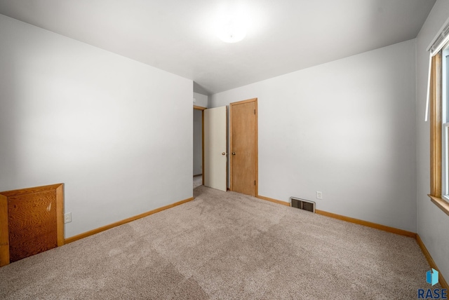 1422 E 17th St, Sioux Falls, SD 57104 - spare room with carpet and baseboards