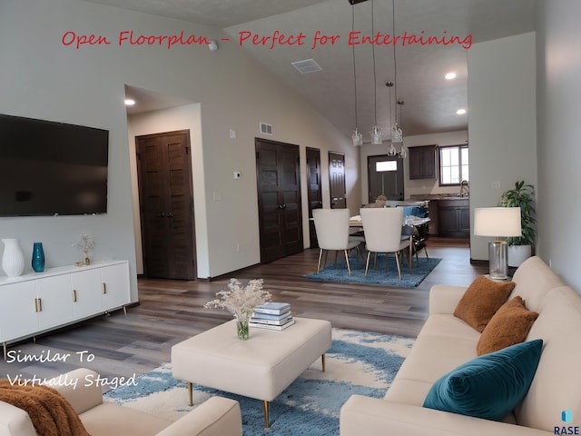 9207 W Ark Pl, Sioux Falls, SD 57106 - living room with wood finished floors, recessed lighting, and high vaulted ceiling