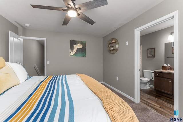 872 S Sycamore Ave Unit 3, Sioux Falls, SD 57110 - bedroom with connected bathroom, baseboards, a ceiling fan, and carpet floors