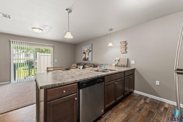 872 S Sycamore Ave Unit 3, Sioux Falls, SD 57110 - kitchen featuring stainless steel dishwasher, a peninsula, a sink, and dark wood-style floors