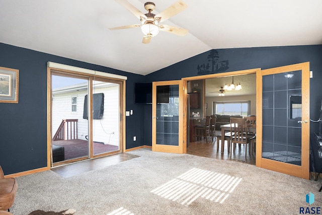 46687 276th St, Lennox, SD 57039 - spare room with vaulted ceiling, baseboards, a ceiling fan, carpet flooring, and tile patterned floors