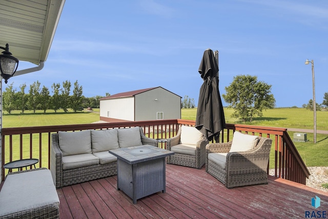 46687 276th St, Lennox, SD 57039 - deck with an outdoor living space and a lawn