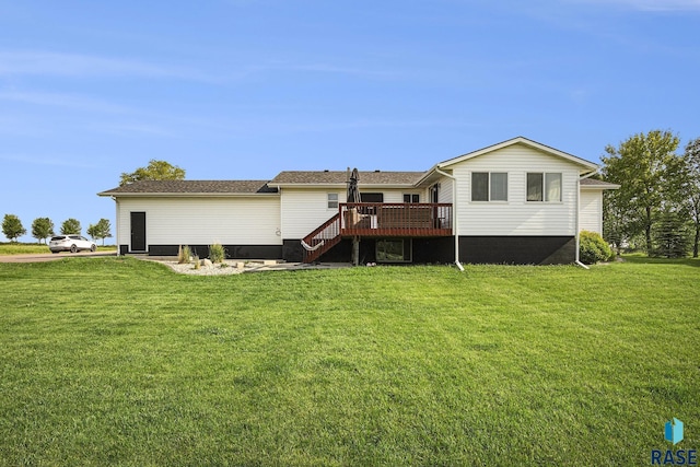 46687 276th St, Lennox, SD 57039 - rear view of house with a wooden deck, stairway, and a yard