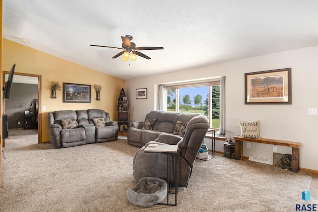 46687 276th St, Lennox, SD 57039 - living area featuring carpet, a ceiling fan, vaulted ceiling, and baseboards