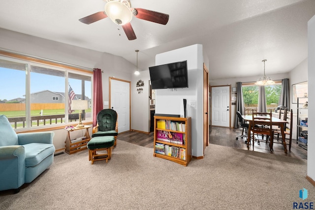 510 Kent St, Harrisburg, SD 57032 - living room featuring carpet floors, ceiling fan, baseboards, and a chandelier